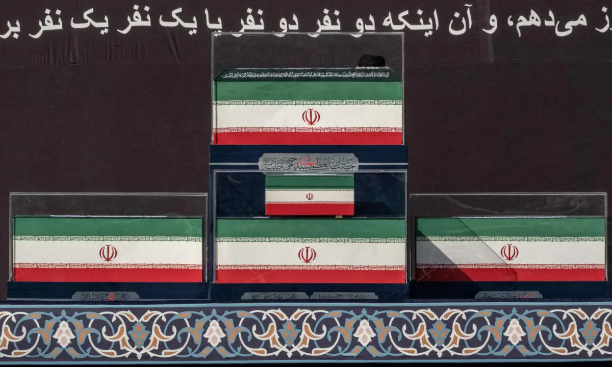 Huge crowds gather in Iran as funeral ceremonies for assassinated supreme leader begin